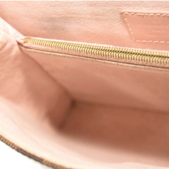 LOUIS VUITTON Damier Ebene Caissa Clutch in Rose Ballerine