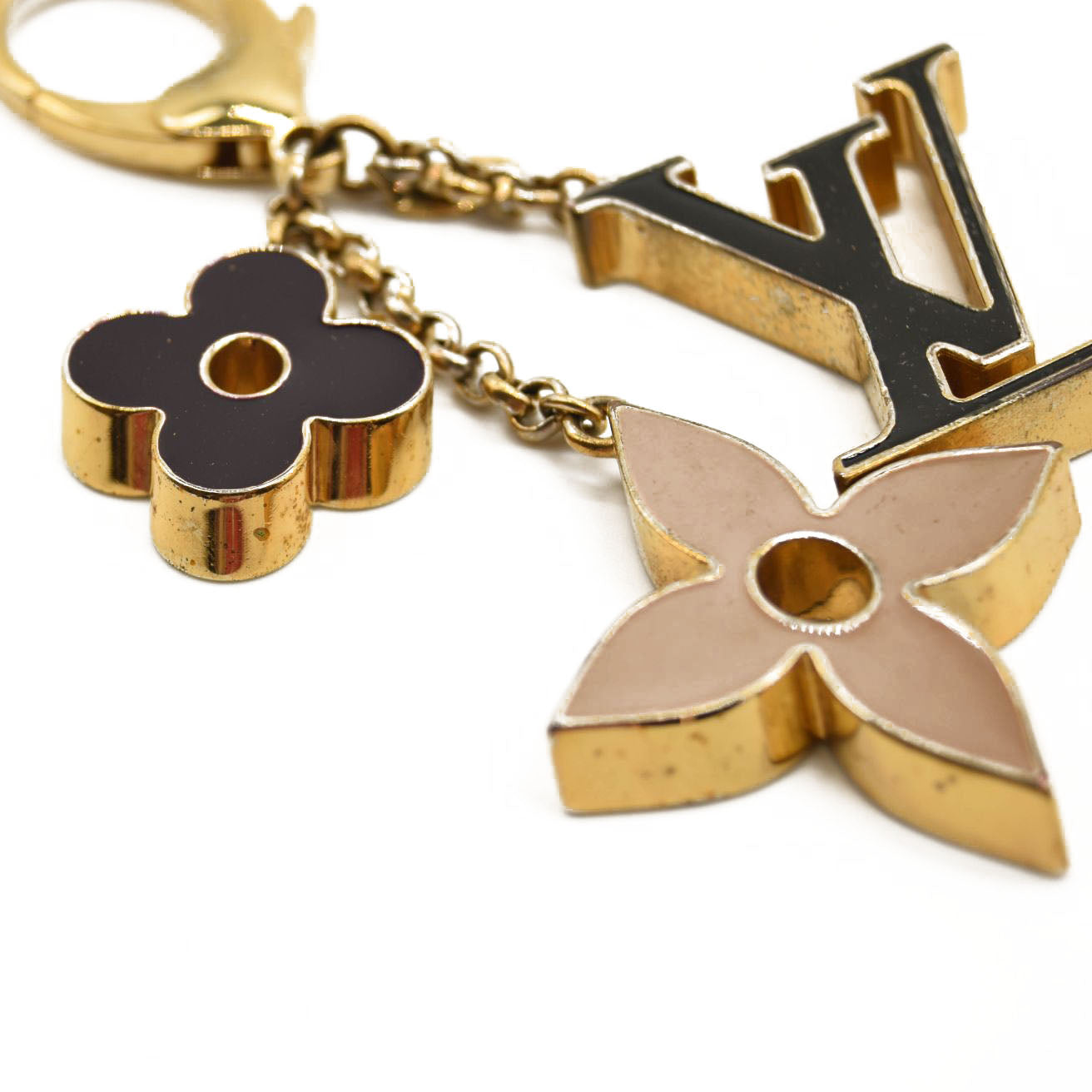 LOUIS VUITTON Metal Enamel Fleur De Monogram Bag Charm Dore
