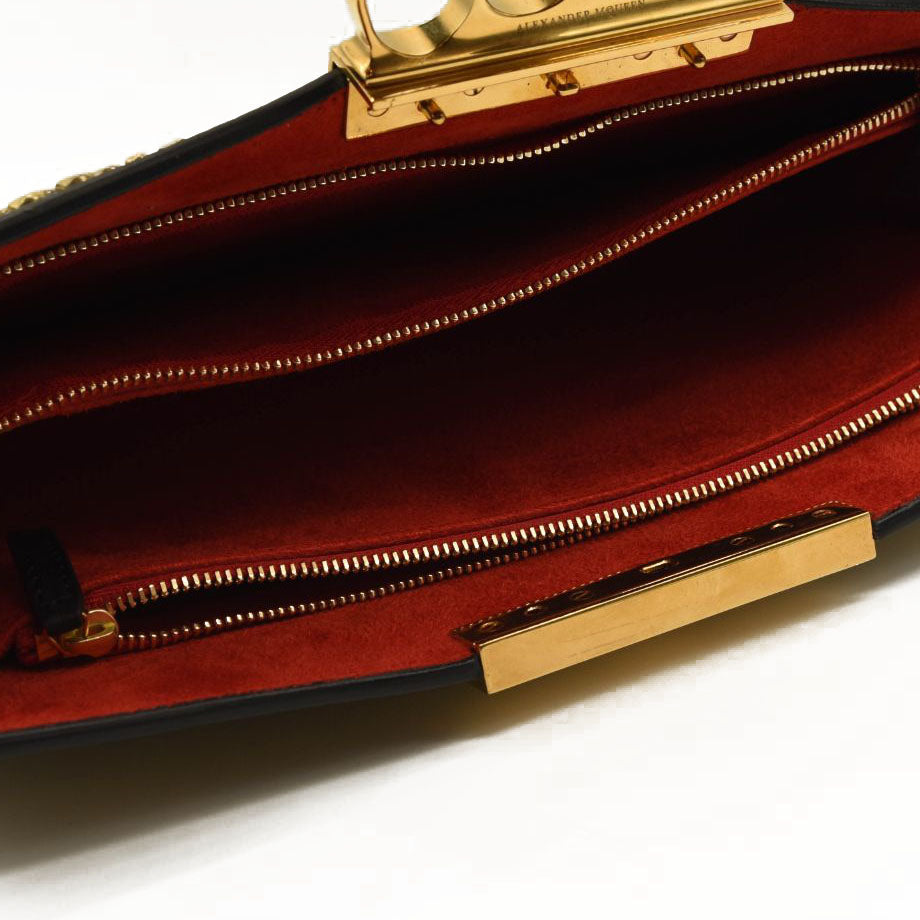 ALEXANDER MCQUEEN Skull Four-Ring Studs Flat Pouch