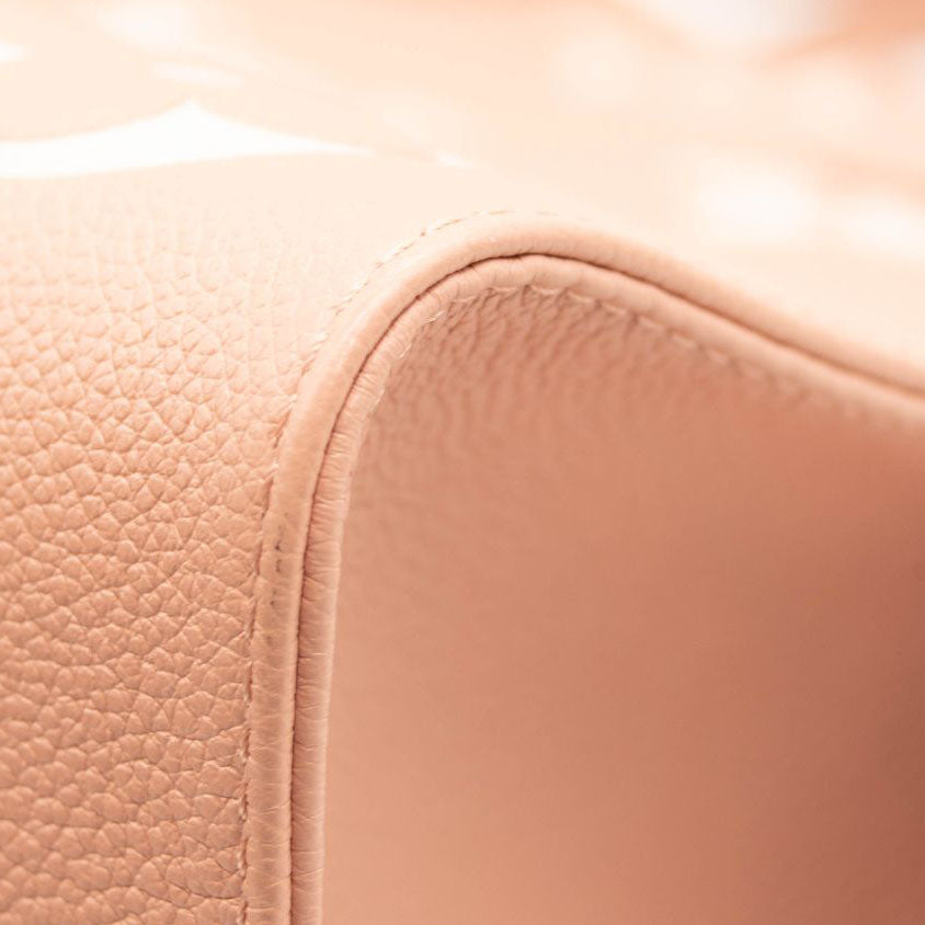 LOUIS VUITTON Empreinte Monogram Giant Onthego MM Arizona Creme