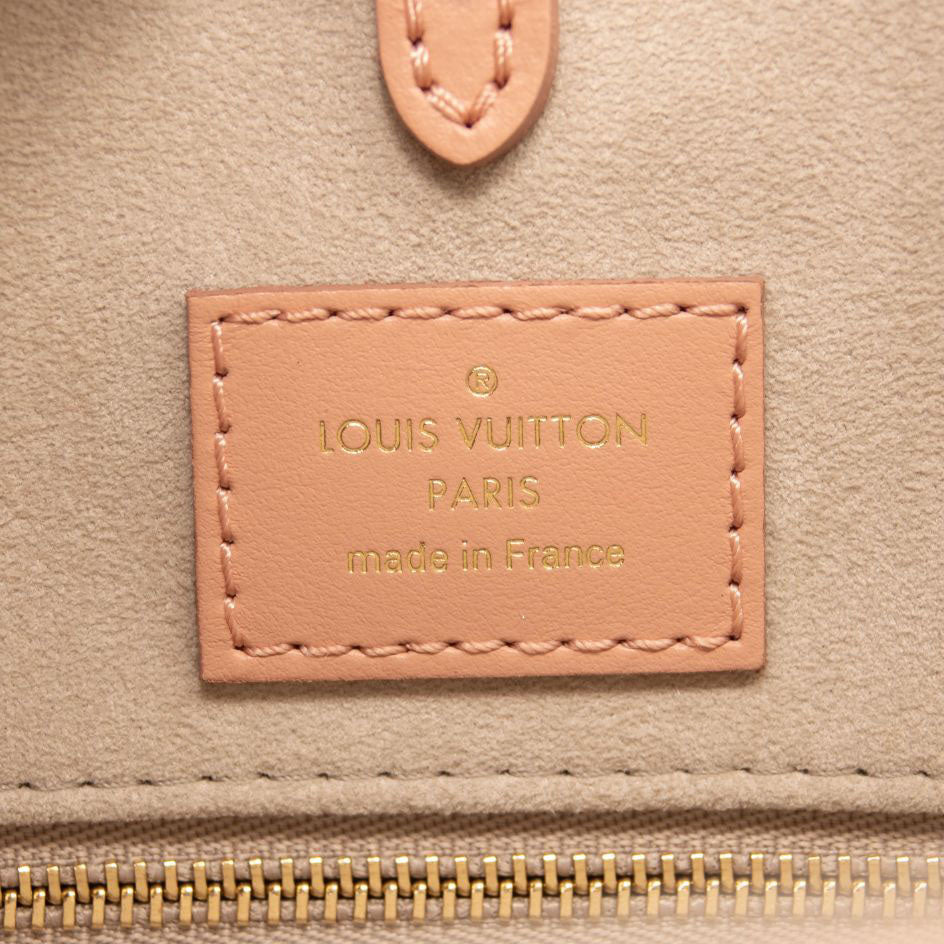 LOUIS VUITTON Empreinte Monogram Giant Onthego MM Arizona Creme