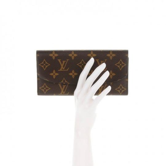 Louis Vuitton emilie wallet Canvas Monogram With Red Button Gently