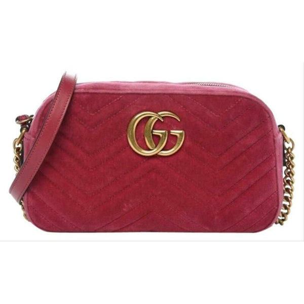 small pink chanel wallet on